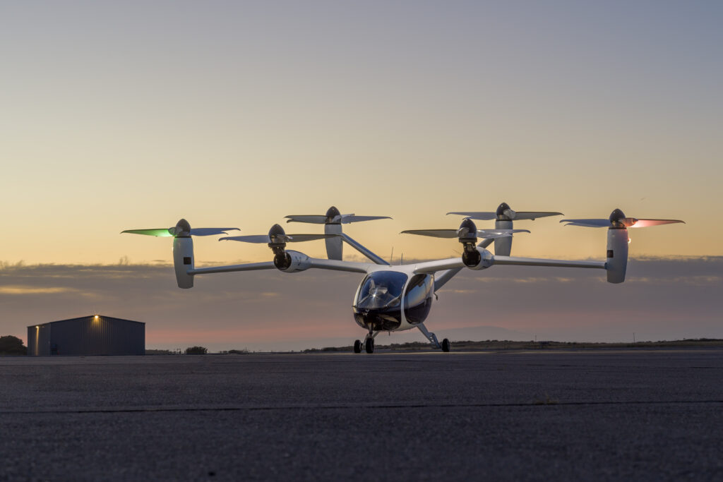 Joby Aviation’s eVTOL aircraft on the tarmac at sunset, showcasing the future of urban air mobility in the GCC