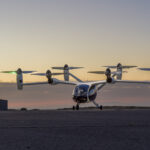Joby Aviation’s eVTOL aircraft on the tarmac at sunset, showcasing the future of urban air mobility in the GCC